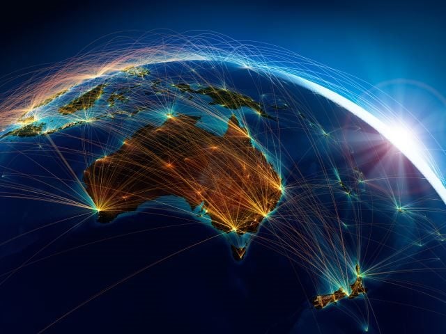 satellite photo of australia with superimposed telecomm lines going from city to city to country