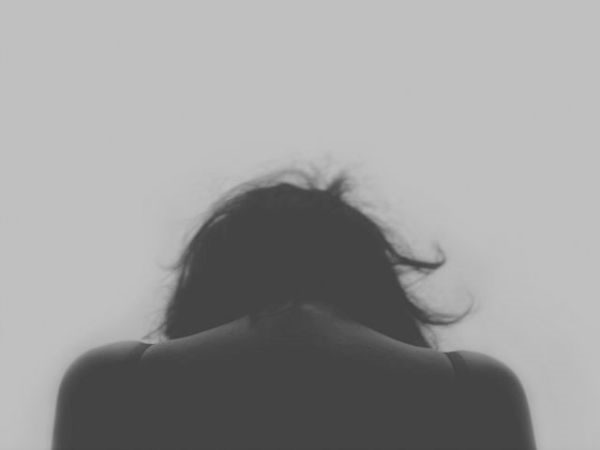 sad woman looking down