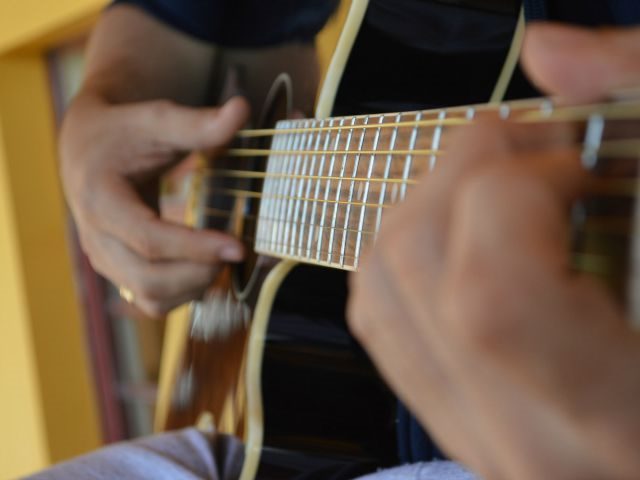 playing guitar