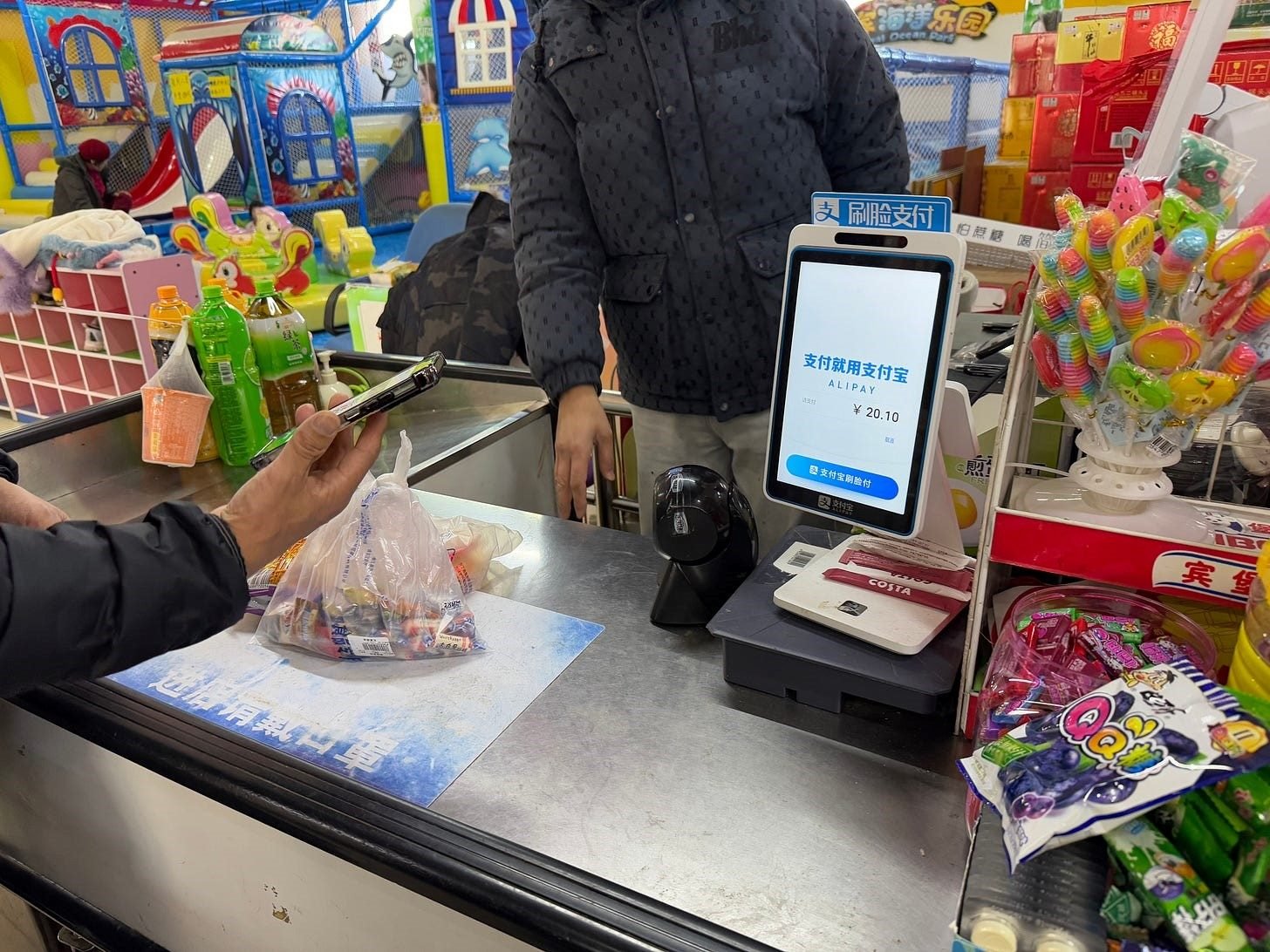 making mobile payment at cash register