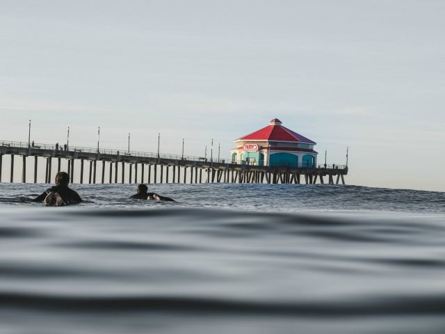 surfers on still water