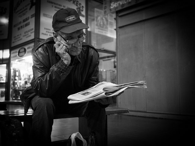 man with newspaper