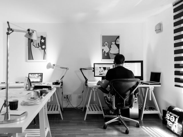man working at a computer