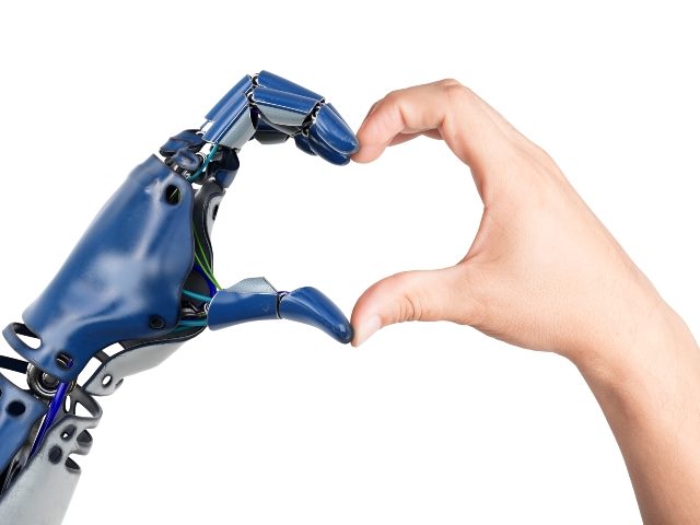 Heart shaped by human and  blue robot hands, symbolizing generative ai apps that will benefit marketers.