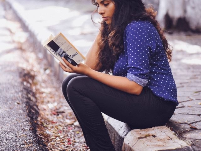woman reading a book