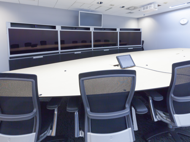 A video conference and telepresence business meeting room