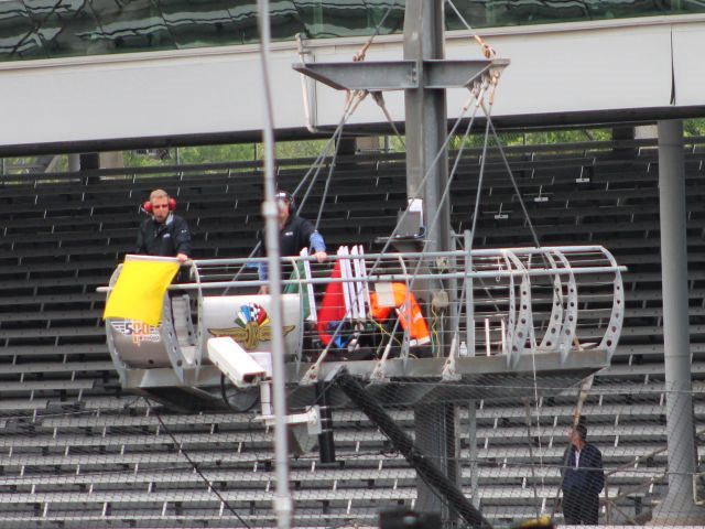 The yellow flag is waved during Practice for the 100th Indianapolis 500 in May 2016.