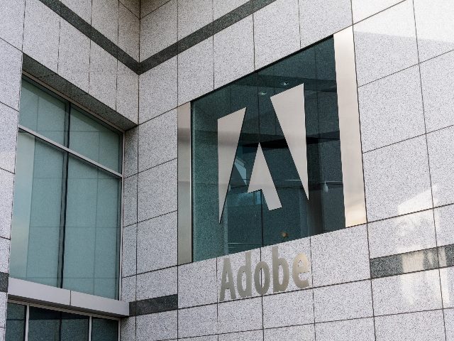 Adobe sign on facade of Adobe World Headquarters in San Jose, California. The $20 billion Adobe-Figma deal fell through.