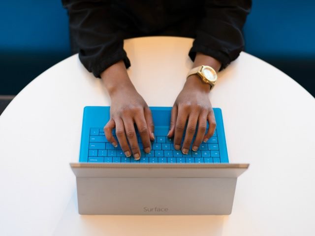 woman using a Surface computer