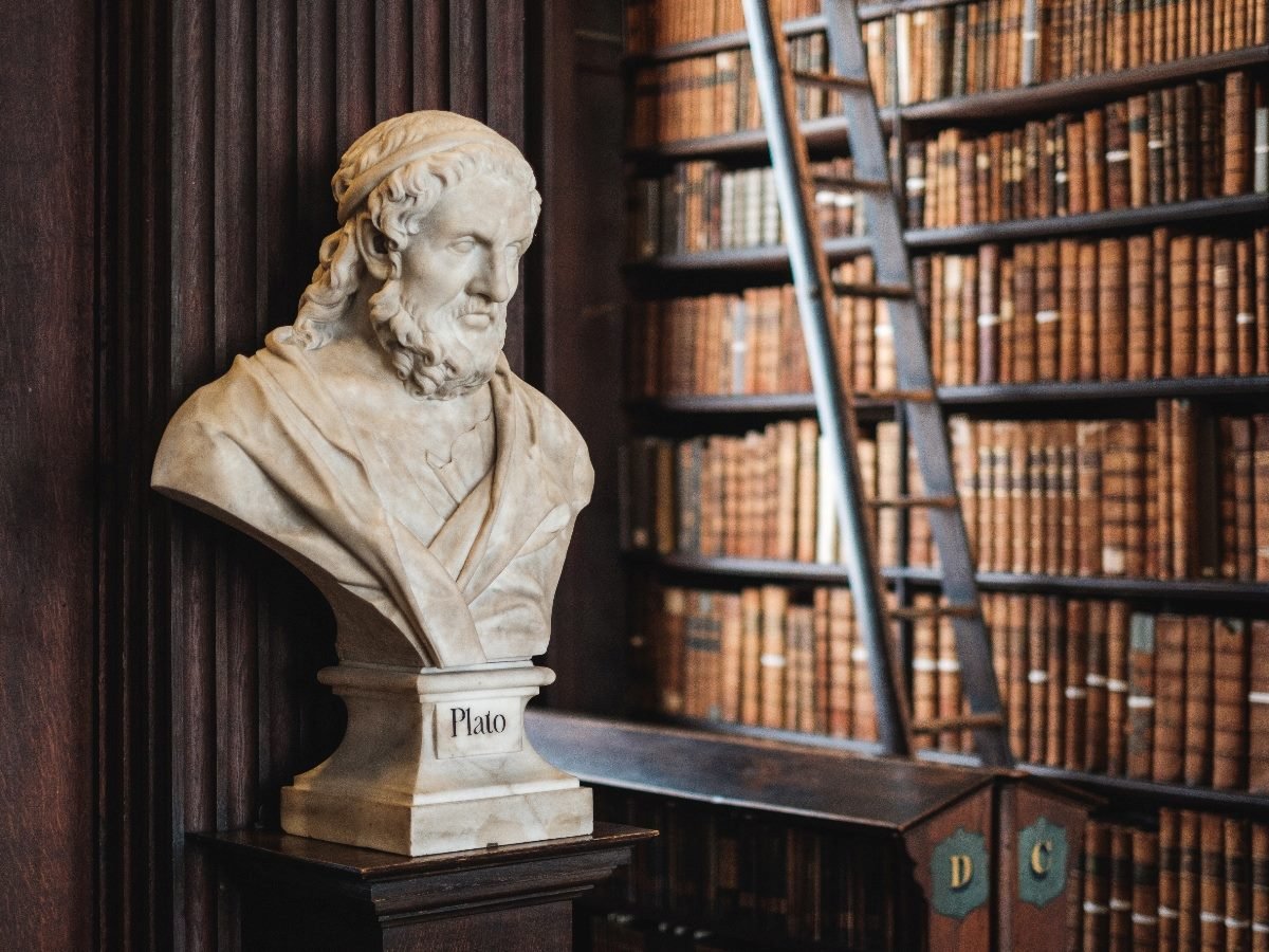 Statue of Plato's head in a library.