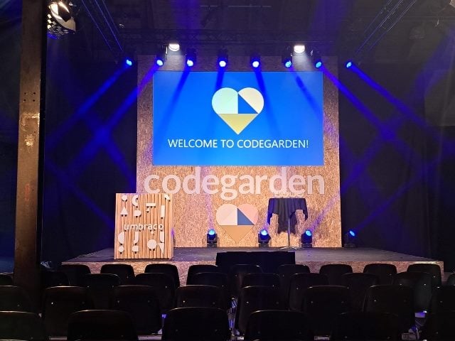 An empty stage at the 2023 Umbraco Codegarden conference.