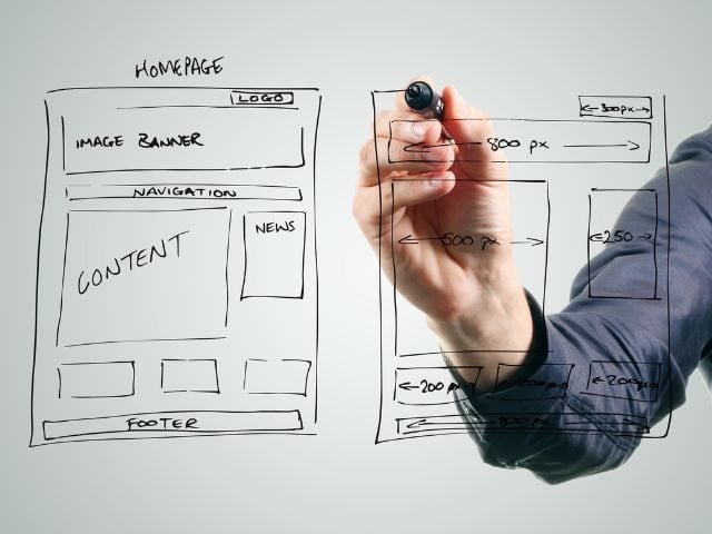 A person planning out a webpage design