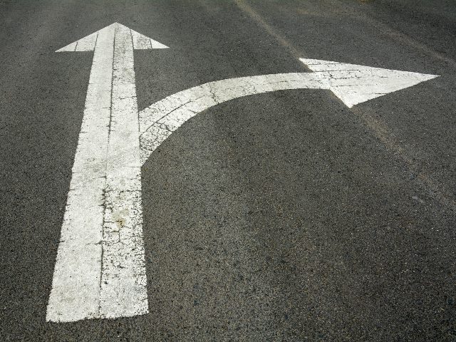 Forward and right turn driving of traffic signs on a road.
