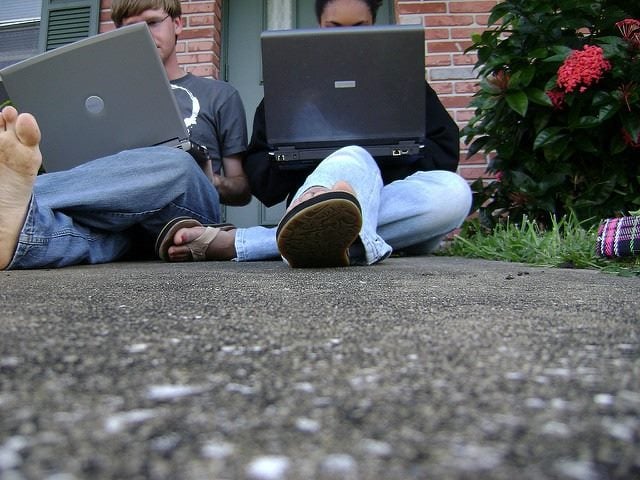 working outside on laptops