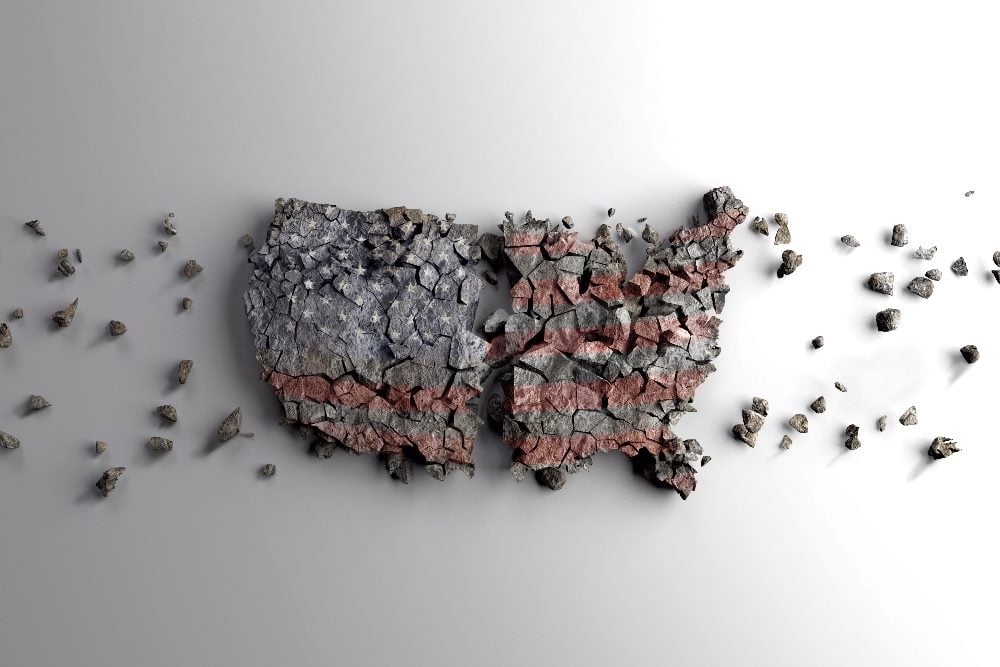A map of the United States made up of broken up rocks that are splintering apart in piece about marketing in a polarized world.