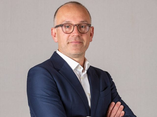 New Sitecore CEO Dave O'Flanagan posing.