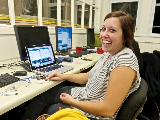 happy person on a computer