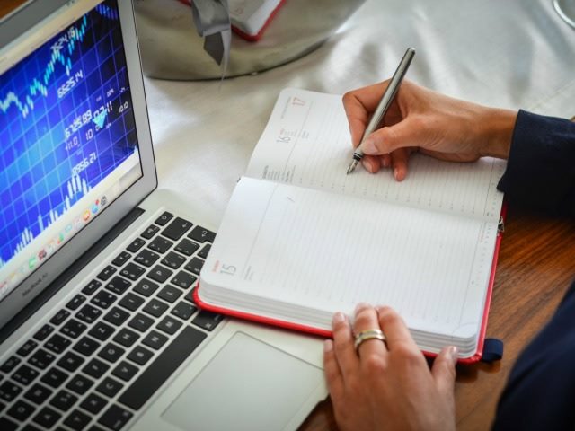 businessperson at a computer
