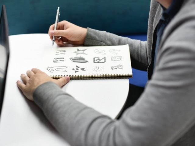 sketchpad full of brand logos