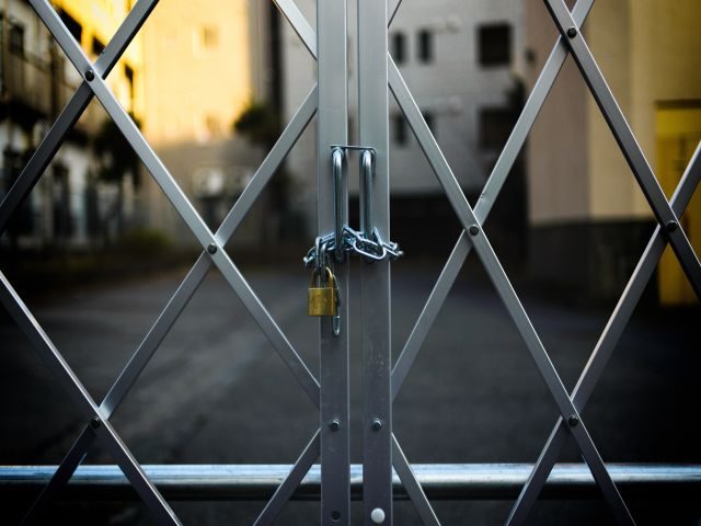 A lgate closed and locked - vendor lock in concept