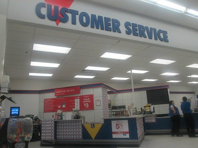 Company with a "customer service" sign.