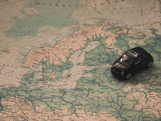 toy car on a map of northern europe