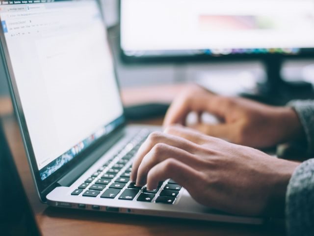 A person using a laptop 
