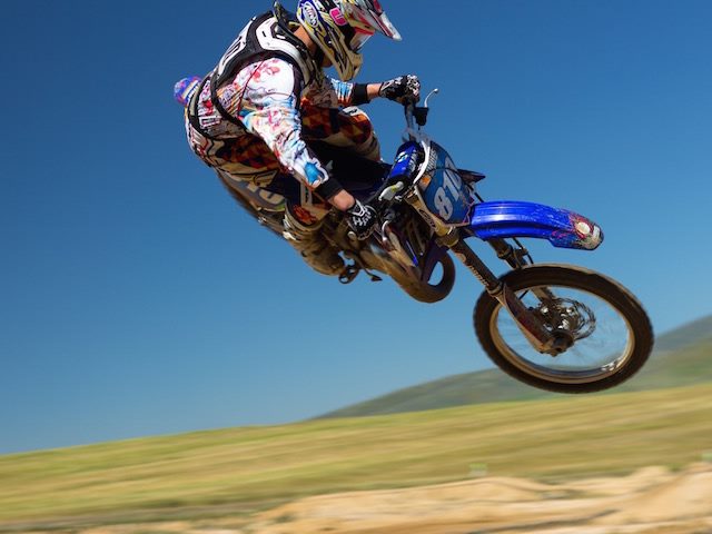 motorcyclist in mid air