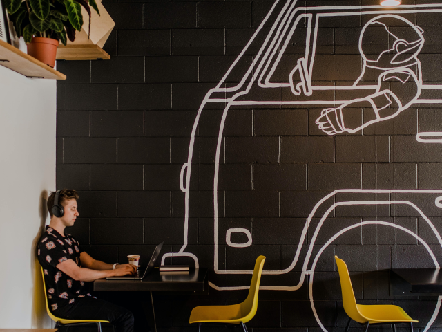 A marketing analyst working on a certification during his lunch - certification concept