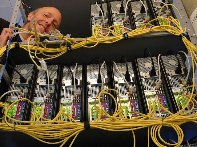 man working on computer servers