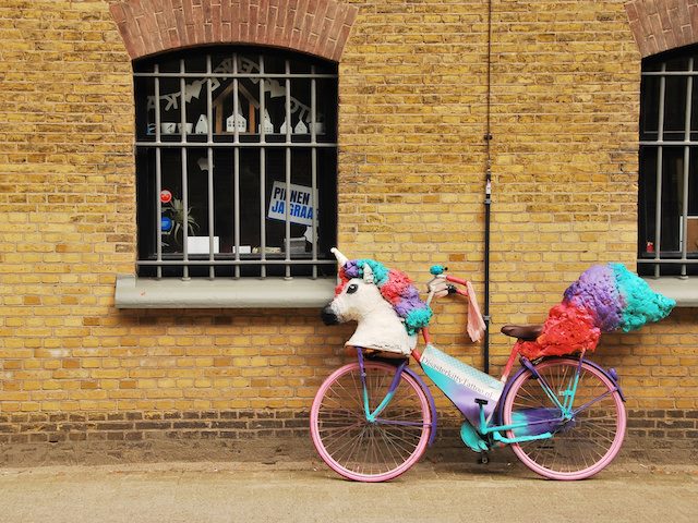 personalized bicycle with unicorn head on handlebars