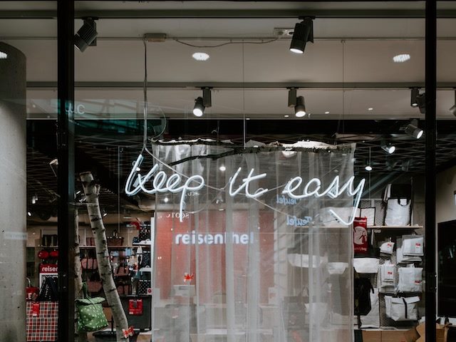neon sign that reads "keep it easy"