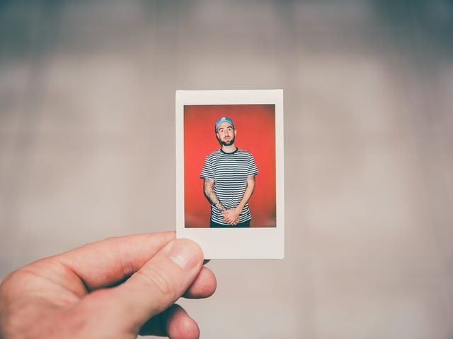 A person holding a snapshot