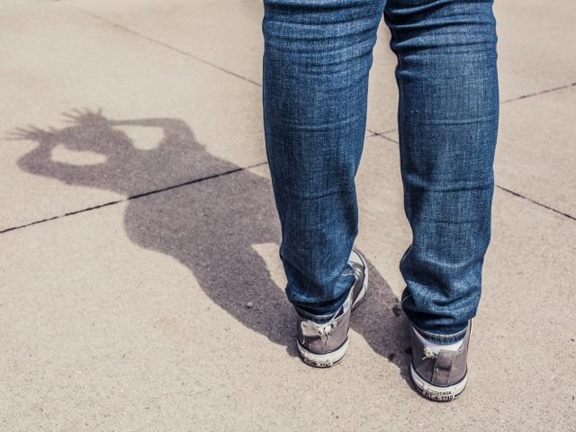 man with his shadow