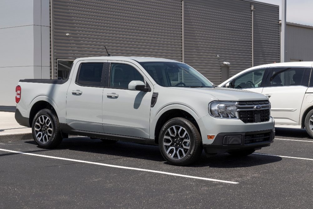 Ford Maverick compact truck display at a dealership in piece about the marketing customer journey.