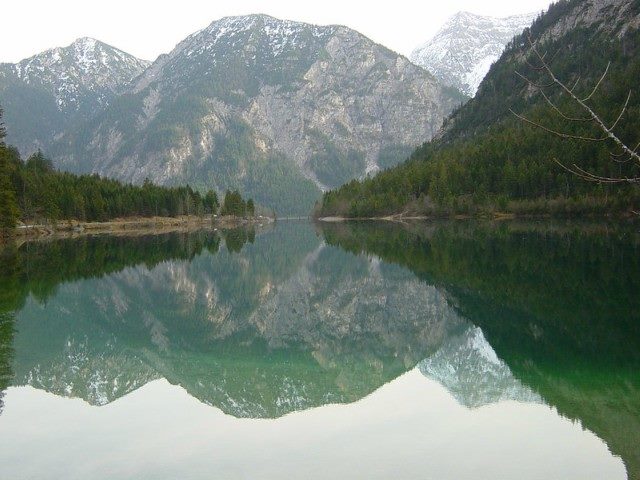 Mountains reflected in water.