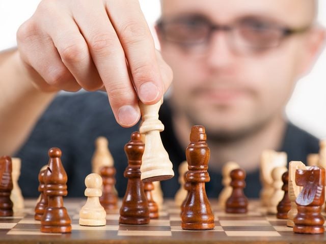 man playing chess