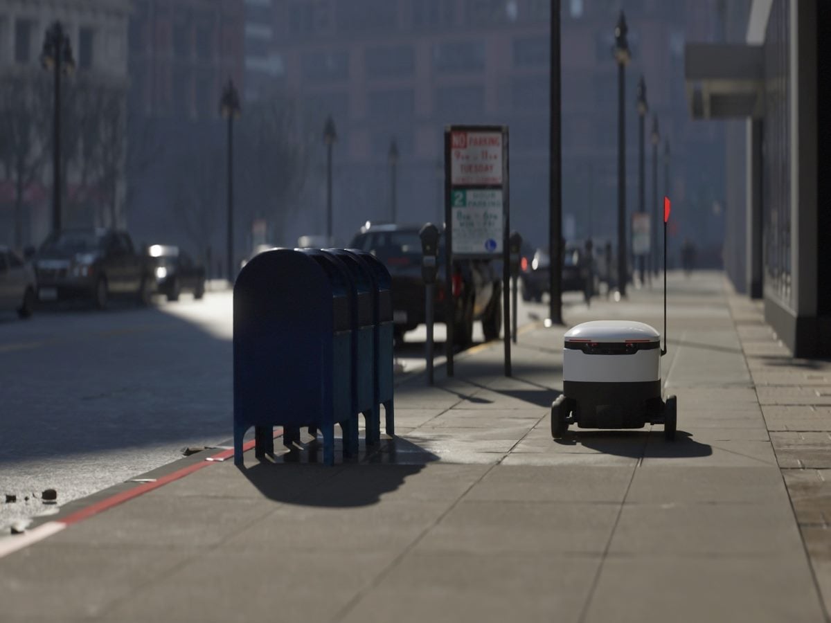 Autonomous delivery robot moves swiftly through a busy city sidewalk, navigating urban infrastructure with smart technology in a modern logistics environment 