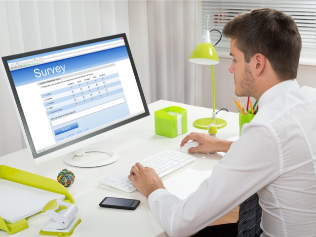 Worker taking an employee engagement survey