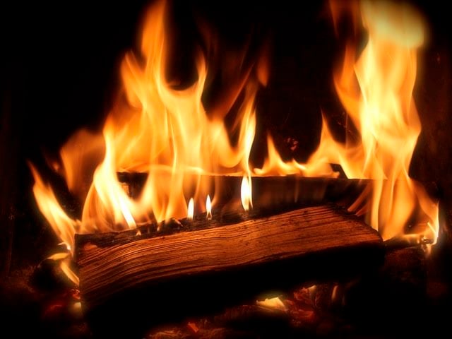blazing fire in a fireplace