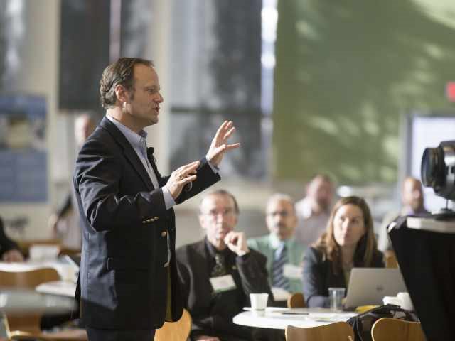 A man presenting on camera