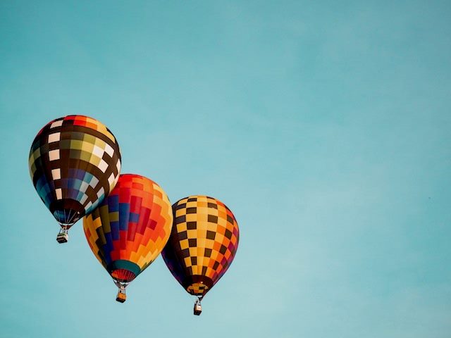 three hot air balloons