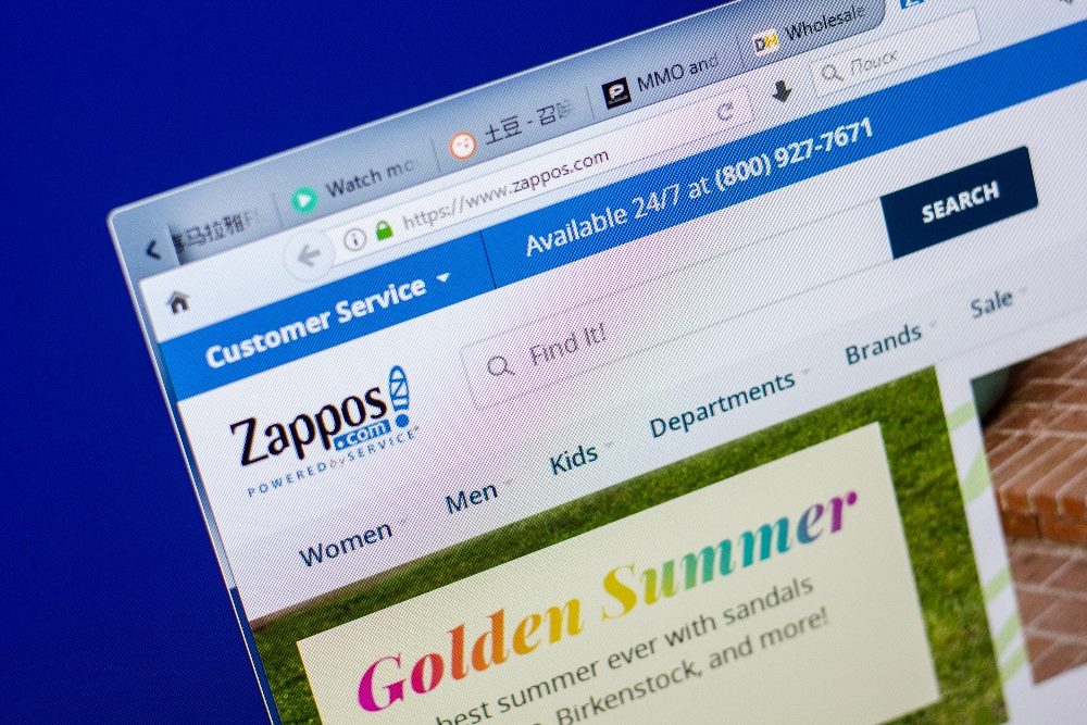 Homepage of Zappos website on the display of a PC.