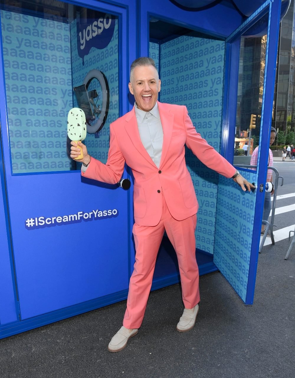 Ross Mathews holding a Yasso yogurt bar for a promotion.