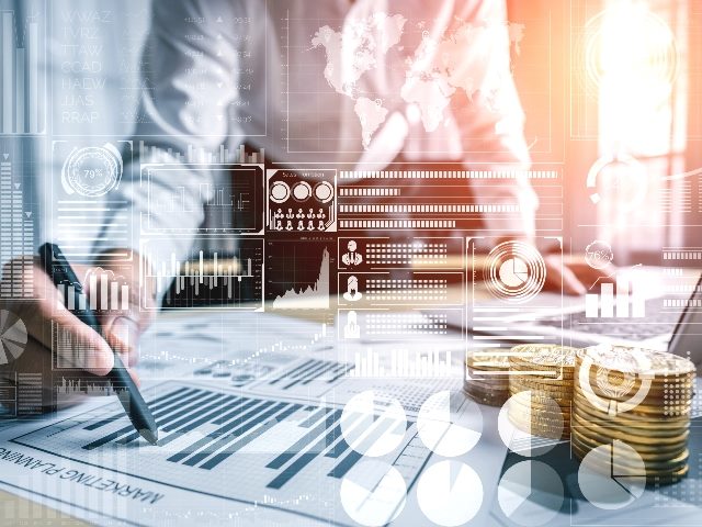 Business man pointing out graphs and funding