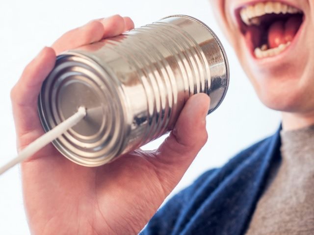 talking into a tin can