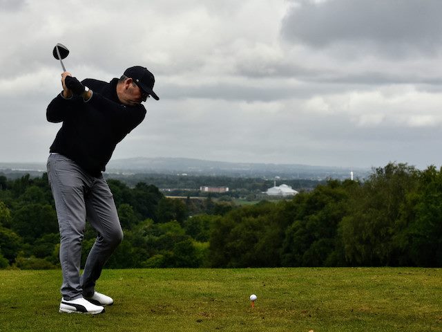 golfer getting ready to hit a ball