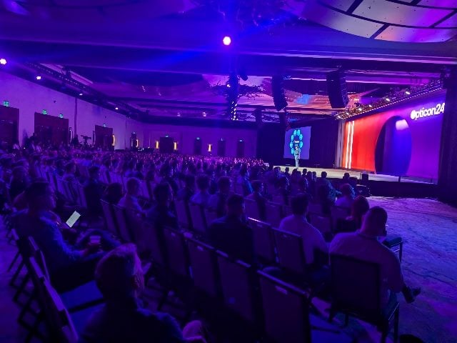 Attendees sitting down in the keynote center at the JW Marriott in San Antonio for Optimizely's Opticon 2024.